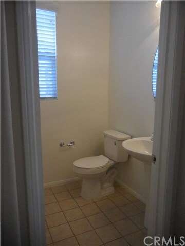 1st floor guest bath with tile floor