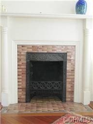 Original fireplace surround in parlor