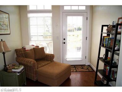 Sunroom. Bright sunroom make a perfect spot to enjoy morning coffee & the paper.