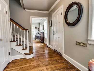 Wood floors greet you upon entering and flow throu
