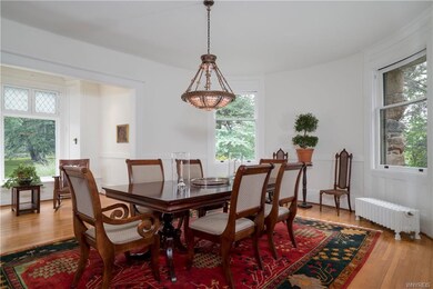 Dining room occupies 1st floor of turret and has c