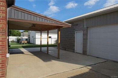 Concrete backyard with Covered Patio!! There is NO