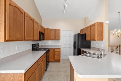 Plenty of cabinets in the kitchen.