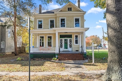View of front of property featuring a porch