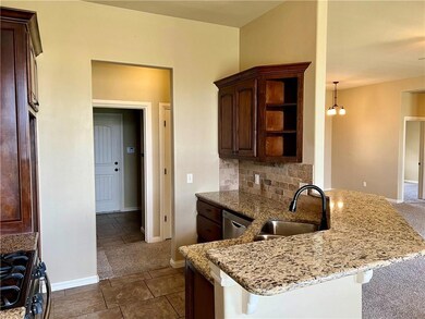 Kitchen opens to living room