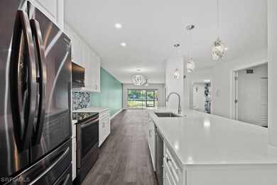 Kitchen featuring appliances with stainless steel