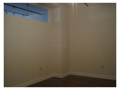 The master features an attached master bath, a wal