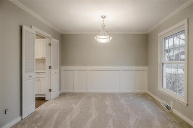 View of dining room from living room. Custom libra