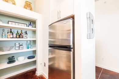 Spacious pantry with additional cabinetry above st