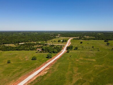 Aerial view of property's location featuring rural landscape