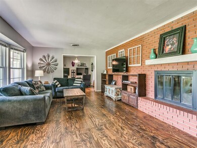 Living room featuring dark hardwood / wood-style f