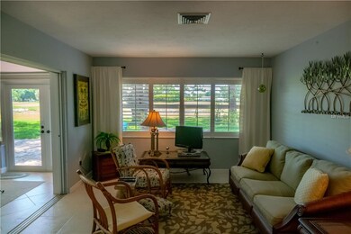 Informal living room with quadruple bank of window
