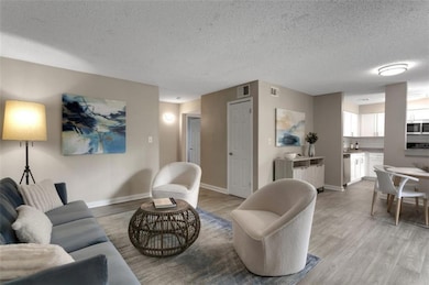 Living room featuring light wood-type flooring and
