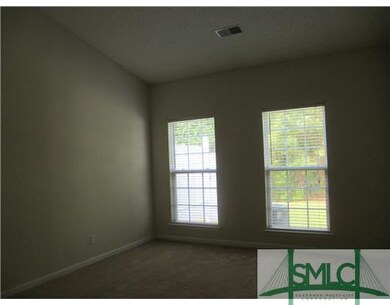 Master Bedroom. VIEW OF WOODED AREA AT BACK OF PRO