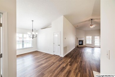 Entrance to home opens up to living areas. Nice area to come into the house.