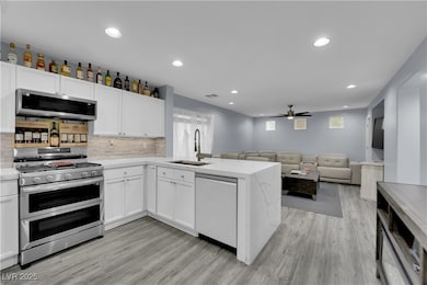 Kitchen with appliances with stainless steel finis