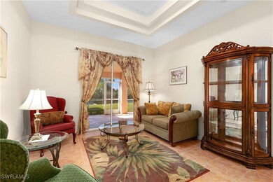 Sitting room featuring light tile patterned floori