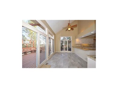 Lots of natural light and deck access off kitchen.
