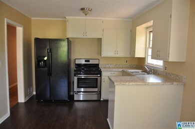 Looking into kitchen from eat in area