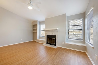 Unfurnished living room with light wood finished 