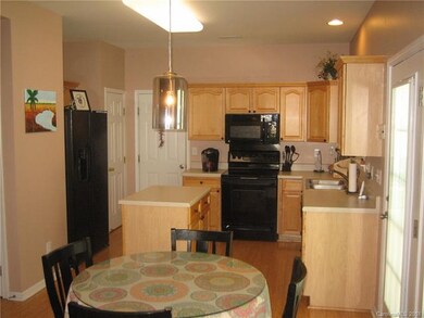 Large eat-in kitchen with island!  Home has a form