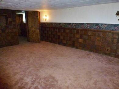 Basement/Game Room. Real parquet wood adorns the w