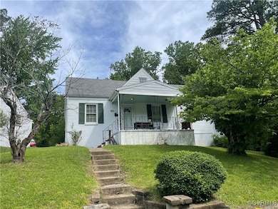 Bungalow-style house with covered porch, a front l
