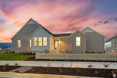View of front of home featuring a fenced front yard, crawl space, and entry steps