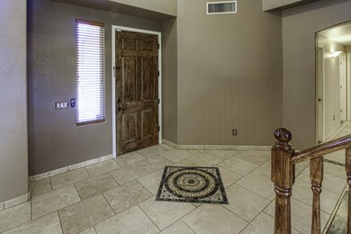 Custom Mosaic Tile At Entry