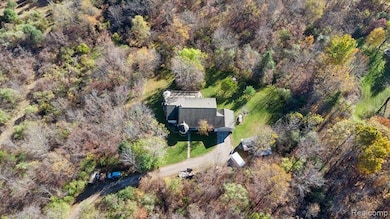 Aerial view of property and surrounding area