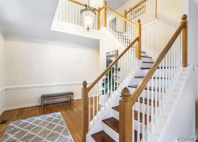 HARDWOODS CONTINUE UP THE STAIRS AND ON THE 2ND FL