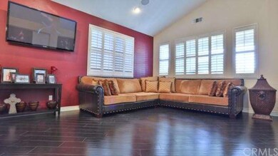 Formal living room area view two with custom paint