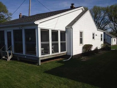 Exterior Front. Side of house and lg screened porc