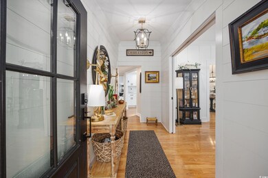 Hallway featuring light wood-type flooring