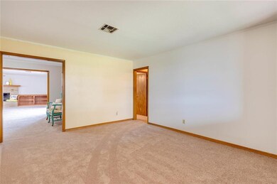 Formal living space viewing dining area and family