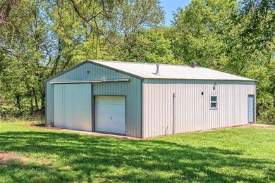 30x40 Shop with electricity, concrete floor, overh
