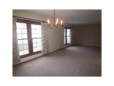 Living Room. Open dining/living area with fresh pa
