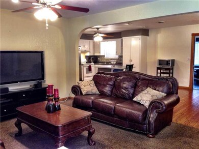 Living Room. Notice living room open to kitchen.