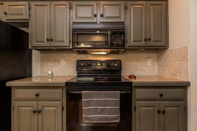 Tumbled stone backsplash.