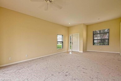 Living Room showing entry and dining area.