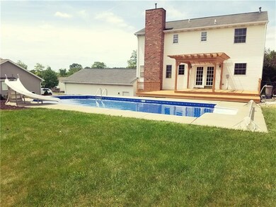 Fully fenced in yard with in ground pool.