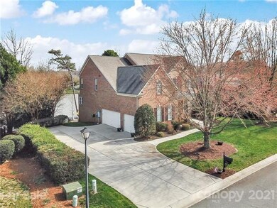 3 car side entry garage with extended driveway and