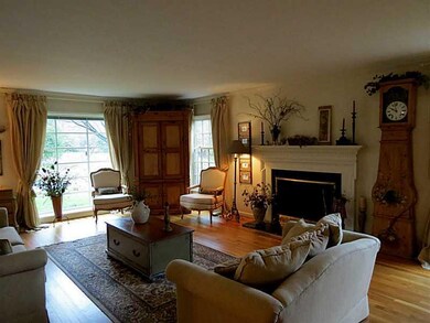 Living Room. The living room is bathed in natural 