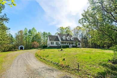Cape cod house with a front yard