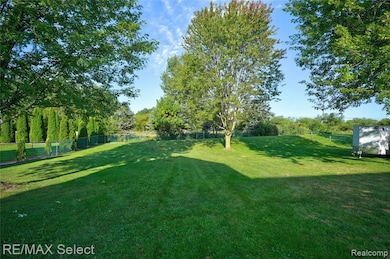 View of fenced backyard