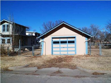 1 car detached garage that you get to from Funston