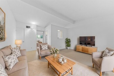 Living area with light tile patterned floors