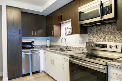 Refrigerator w/Ice Maker, Range/Oven, Microwave Hood, Dishwasher, Disposal.