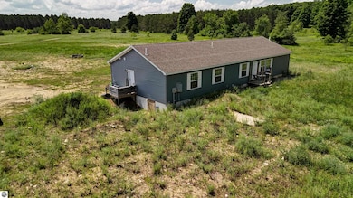 303 Westwood Rd NW, Alden, MI 49612 - photo 6