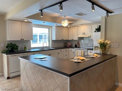 Large kitchen with ample cabinet storage.